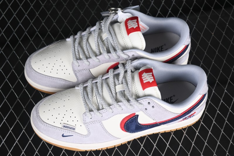 Nike SB Dunk Low UN Collaboration Anniversary Edition Custom Lifestyle Sneakers with Black Swoosh and Gum Sole - DM6868-032