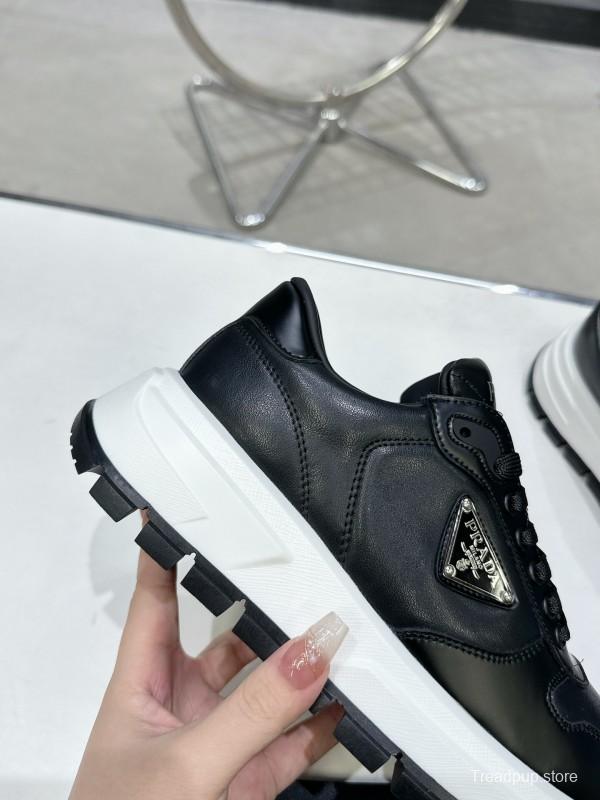 2025 Unisex Prada Black Leather Sneakers KFY00310